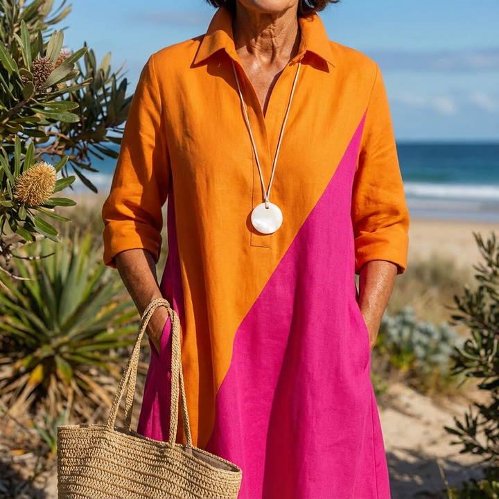 Versatile women's color-block midi dress, featuring long sleeves and an A-line cut, a chic statement dress.