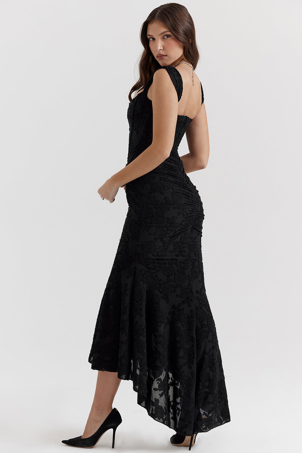 Fitted bodycon homecoming dress with an elegant corset bodice & high-low hem. Ideal for special occasions.