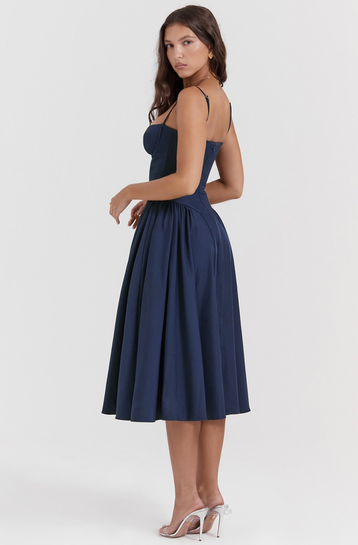 Detailed women's corset midi dress, elegant and figure-hugging formal attire.
