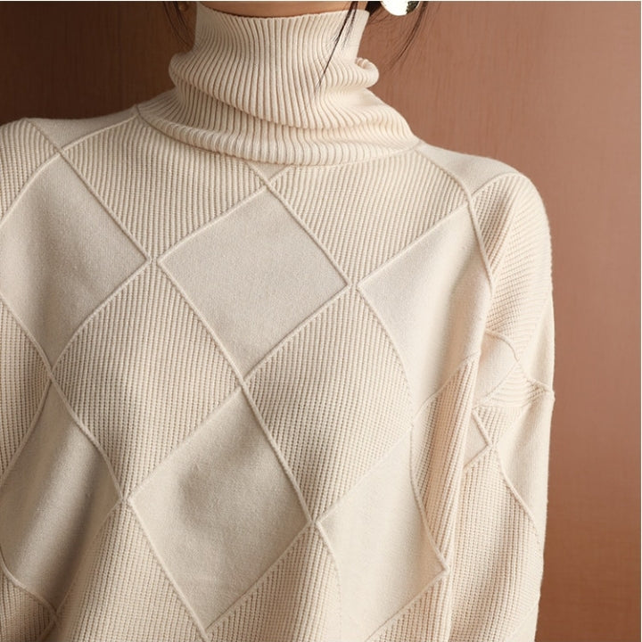Warm women's cozy turtleneck sweater, perfect for stylish fall and winter outfits. Elegant everyday casual pullover.