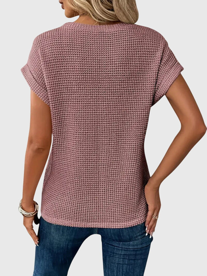 Elegant women's crew neck blouse, versatile for both casual comfort and stylish workwear fashion.