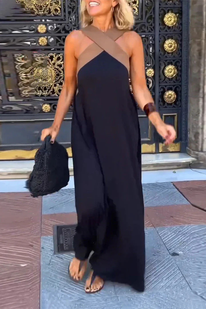 Elegant women's cross neck flowy maxi dress, perfect for evening or casual wear. Versatile summer fashion.