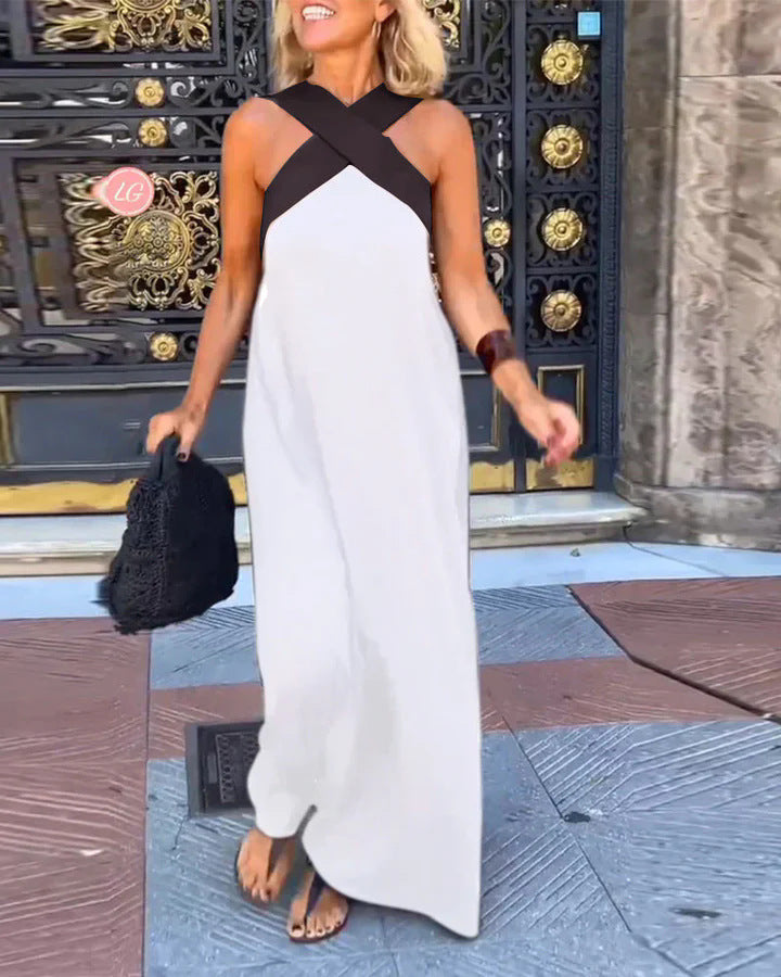 Versatile women's elegant flowy maxi dress with a stylish cross neck. Perfect for summer and day to night wear.