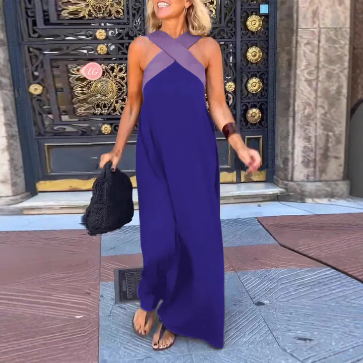 Flowy maxi dress for women, featuring a stylish cross neck and long silhouette. Ideal for day to night elegance.
