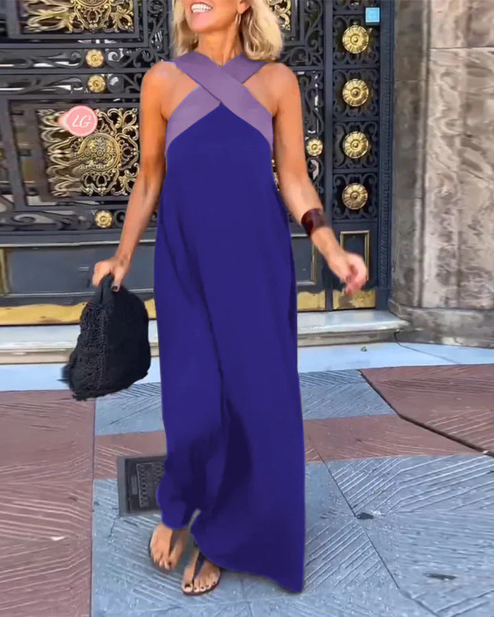 Women's versatile flowy maxi dress with a flattering cross neck design. Suitable for casual or elegant events.