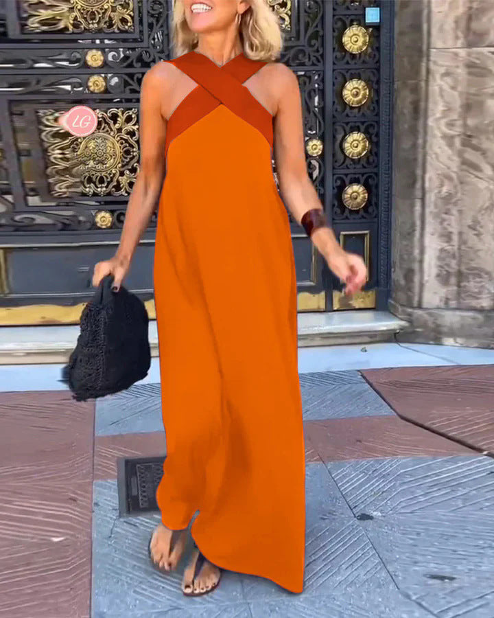 Chic women's flowy maxi dress, featuring a unique cross neck. A must-have elegant and versatile long dress.