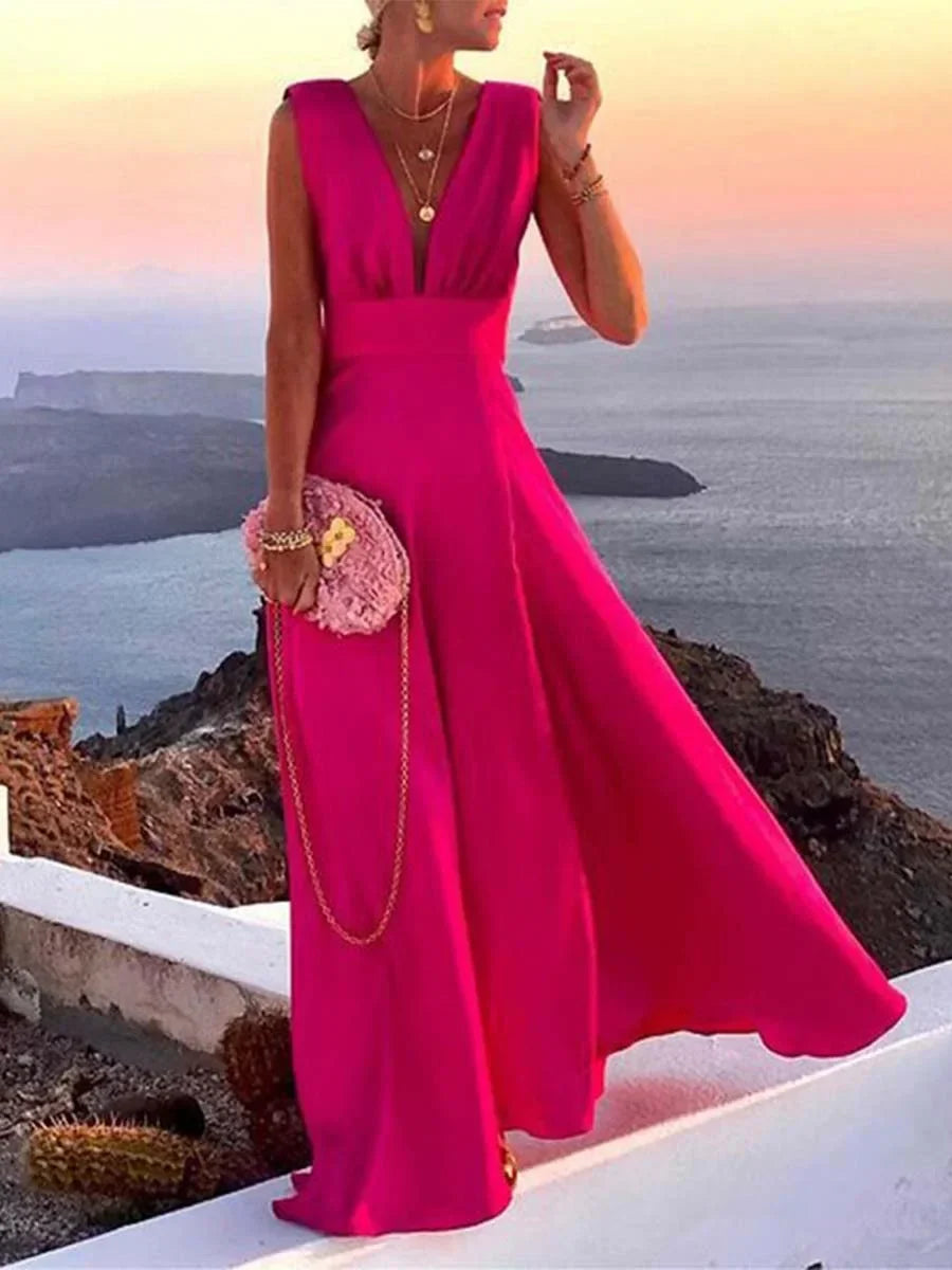 Elegant women's deep V-neck flowy maxi dress, sleeveless style, perfect for summer parties or evening events.