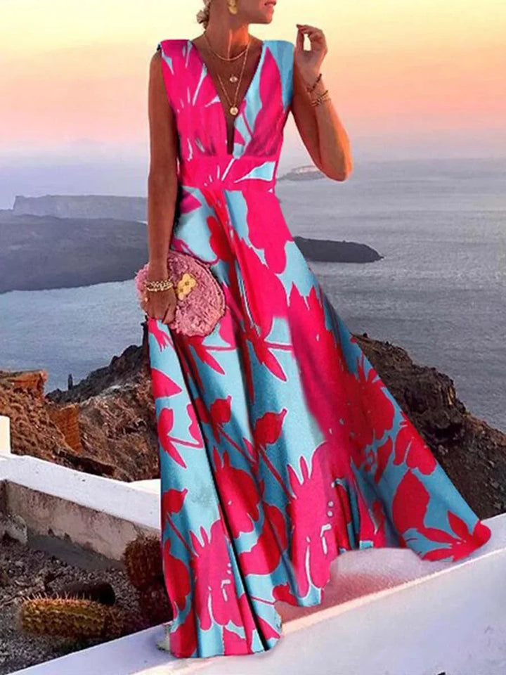 Beautiful blue sleeveless deep V-neck flowy maxi dress, ideal as a stylish summer dress or evening gown.