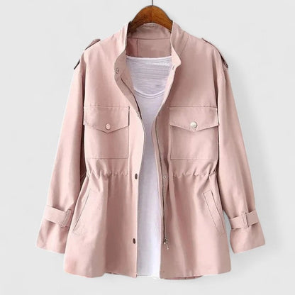 Close-up of a women's double-breasted long overcoat, showcasing classic buttons & timeless elegant style.