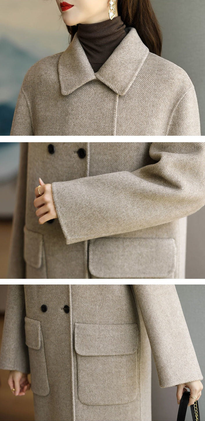 Modern classic women's elegant structured double-breasted coat, ideal for sophisticated autumn/winter outerwear.