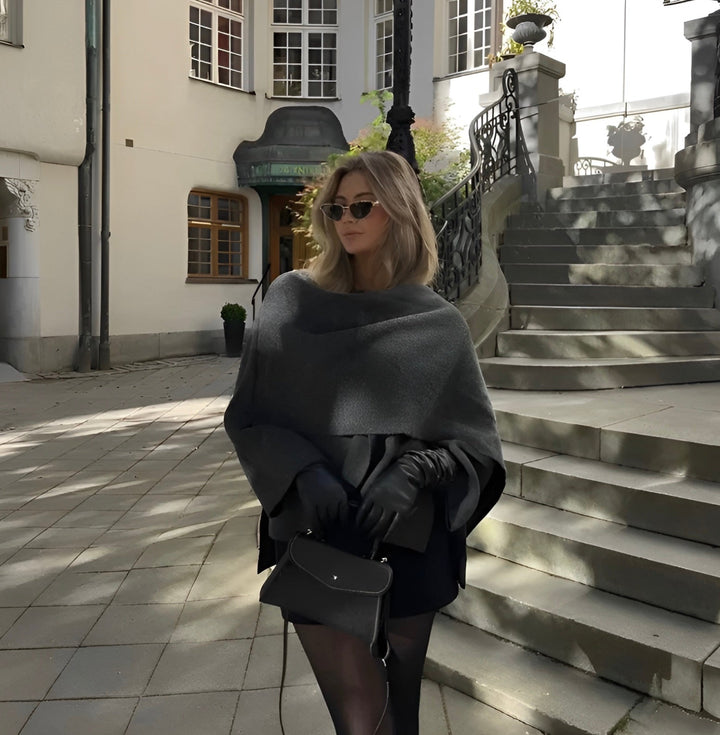Chic women's drape cape coat, versatile outerwear for fall & winter. Flowing, asymmetrical design, an effortless statement piece.