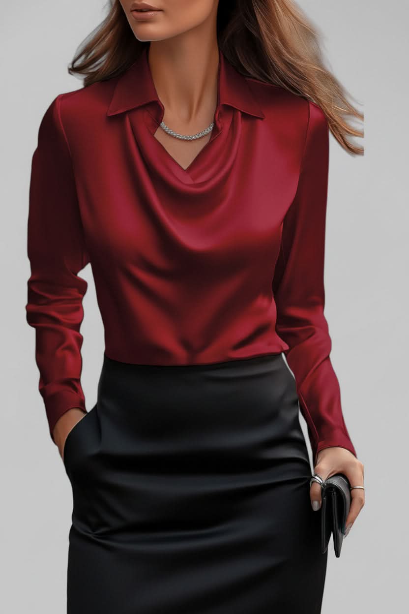 Women's long-sleeve blouse with elegant draping, a sophisticated and versatile fashion piece.