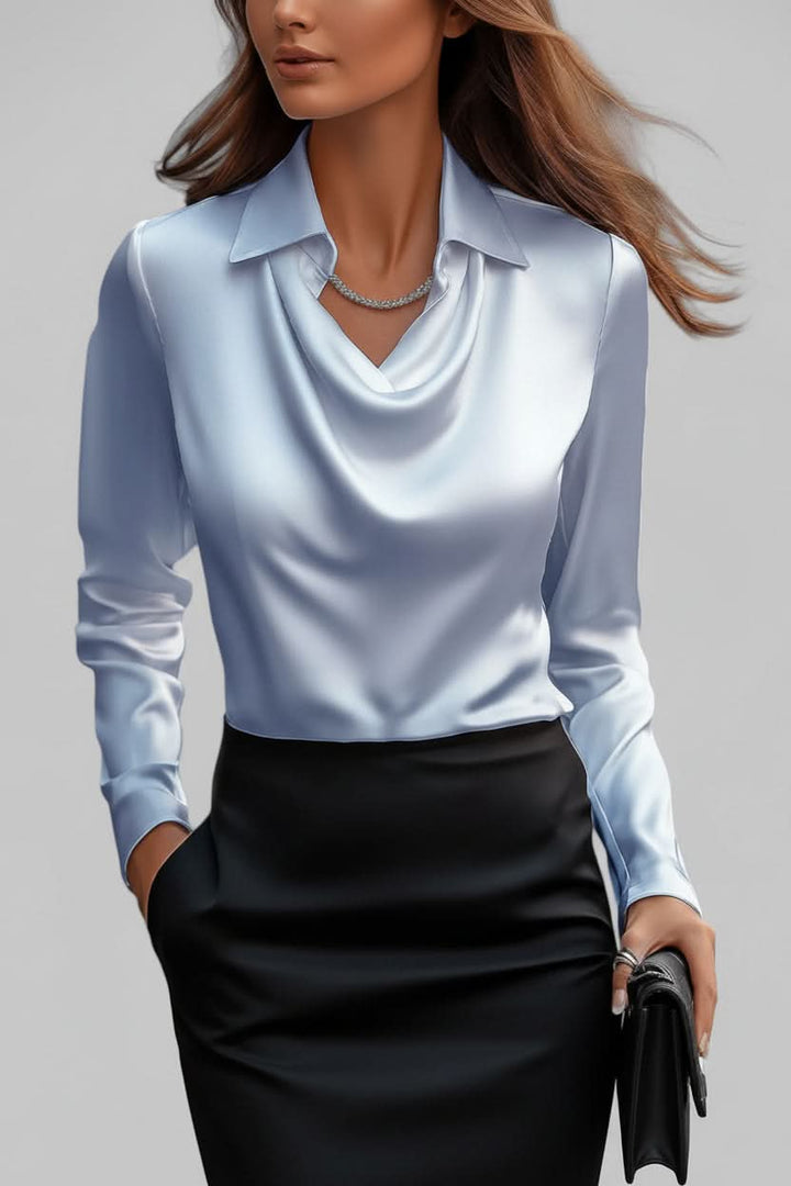 Comfortable and elegant women's draped top with long sleeves, a versatile blouse for any occasion.
