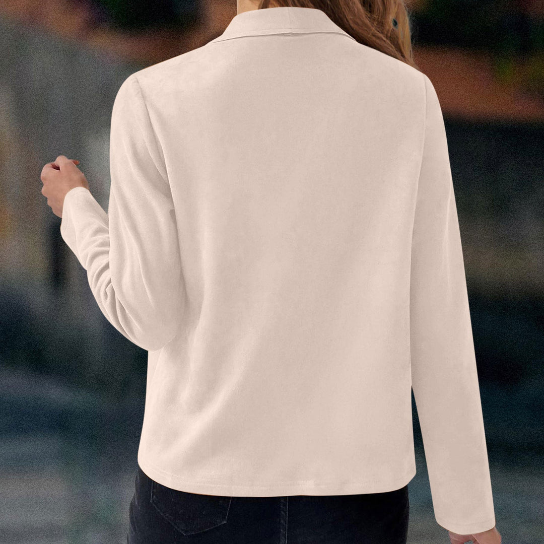 Chic women's outerwear: an open front jacket with a sophisticated waterfall lapel & long sleeves.