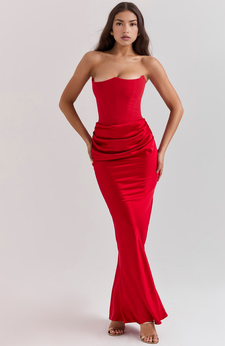 Women's elegant strapless wedding guest dress, with beautiful draping.