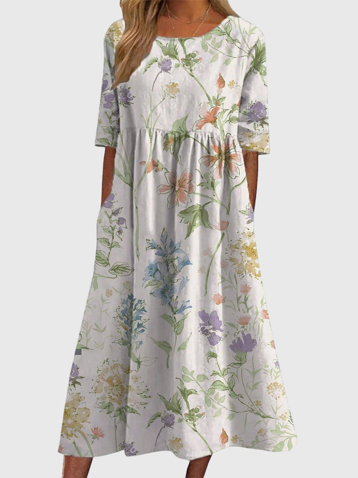 Versatile women's embroidered midi dress, a chic and comfortable choice for summer parties or casual outings.
