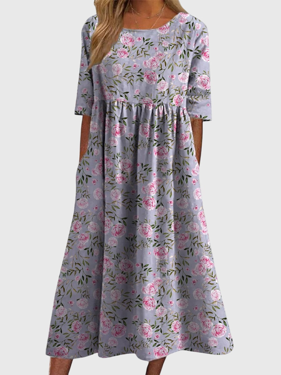 Stylish women's embroidered midi dress, featuring a flowy design for ultimate comfort and elegance.