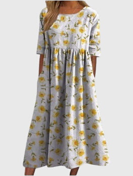 A must-have women's embroidered flowy midi dress, suitable for special occasions or everyday elegant style.
