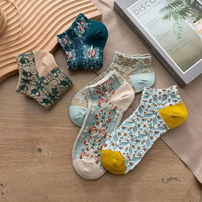 Chic women's mid-calf lace socks with intricate embroidery. Breathable, durable, & comfortable footwear.