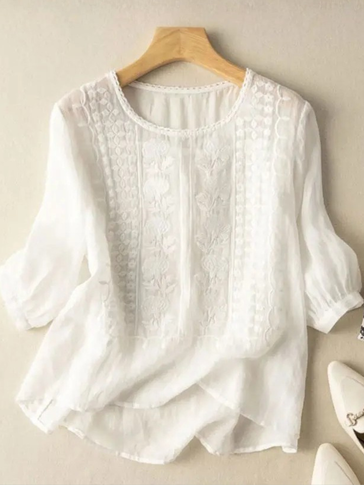 Elegant women's embroidered relaxed fit blouse, perfect for stylish comfort & everyday wear.