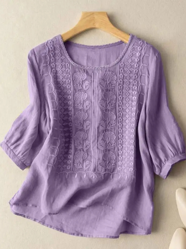Versatile embroidered women's top, relaxed fit, for elegant everyday fashion & comfort.