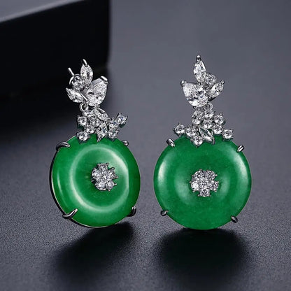 Women's glamorous emerald green gemstone drop earrings, crafted from durable stainless steel for lasting elegance.