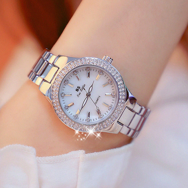 Elegant Women's Esmée Quartz Watch with a sleek stainless steel band and classic round dial.