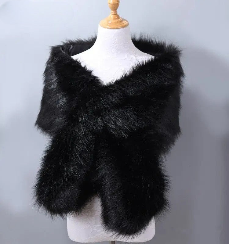 Graceful women's faux fur shawl draped, a sophisticated formal wear and evening accessory.