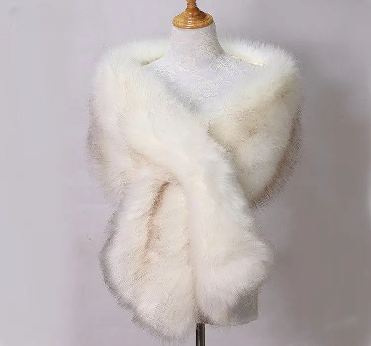 Elegant women's faux fur shawl, a soft and cozy winter fashion accessory for a sophisticated look.