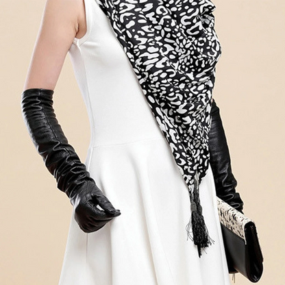Elegant women's faux leather elbow gloves. Perfect formal accessory for fashion.