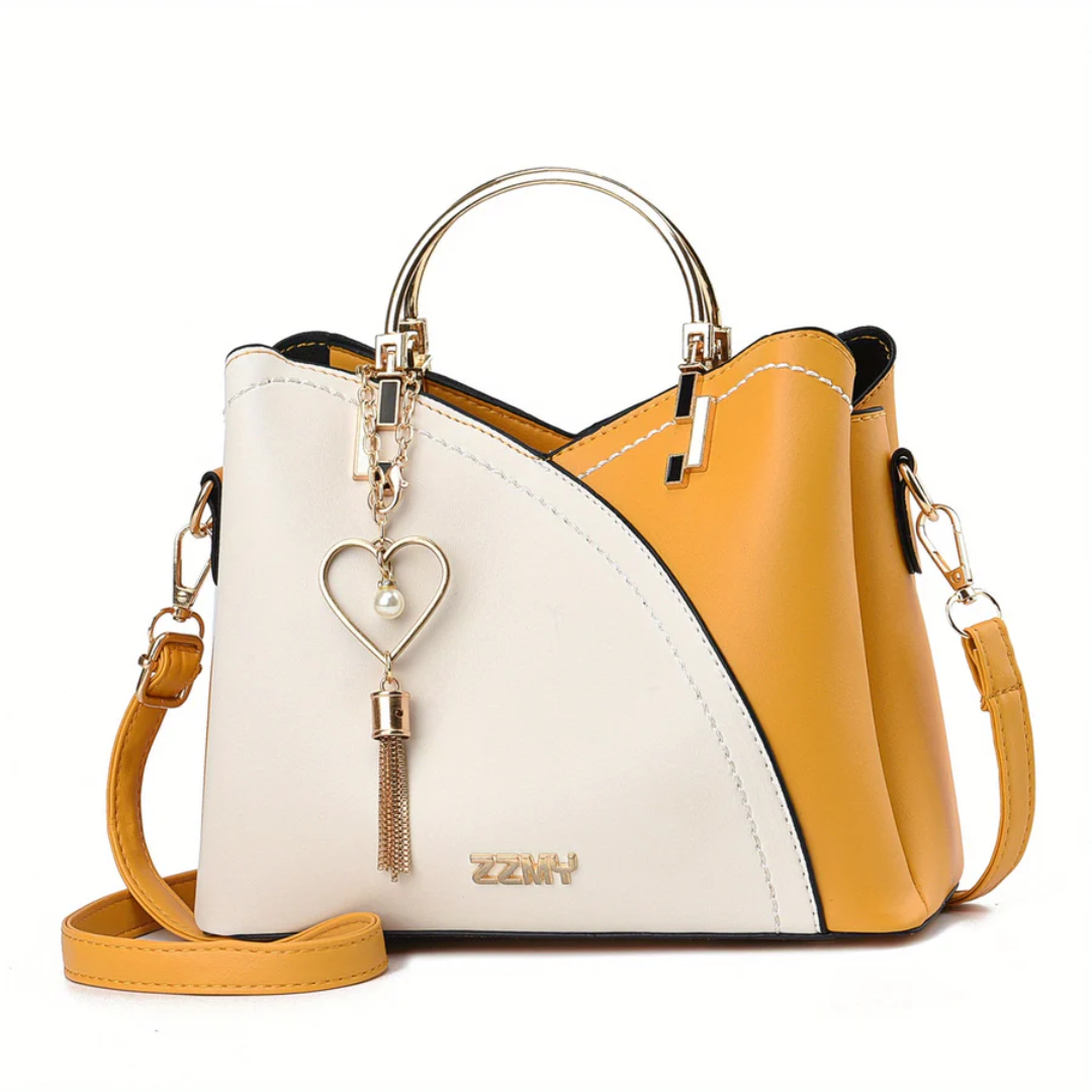 Graceful faux leather women's handbag, a chic shoulder bag for daily elegance.