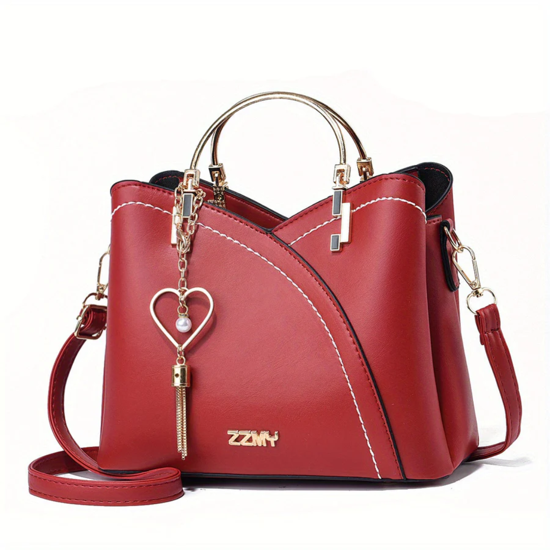 Everyday versatile faux leather ladies' handbag. An elegant shoulder bag option for convenience.