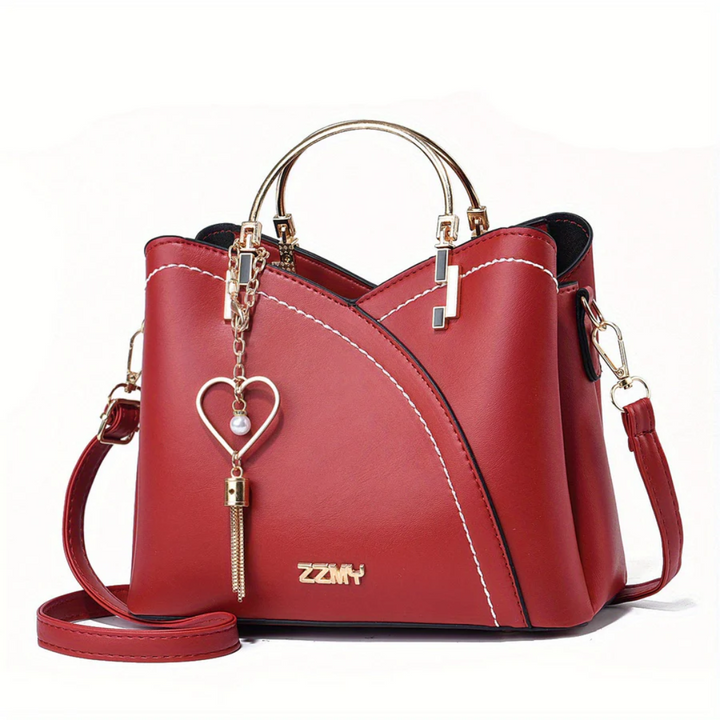 Everyday versatile faux leather ladies' handbag. An elegant shoulder bag option for convenience.