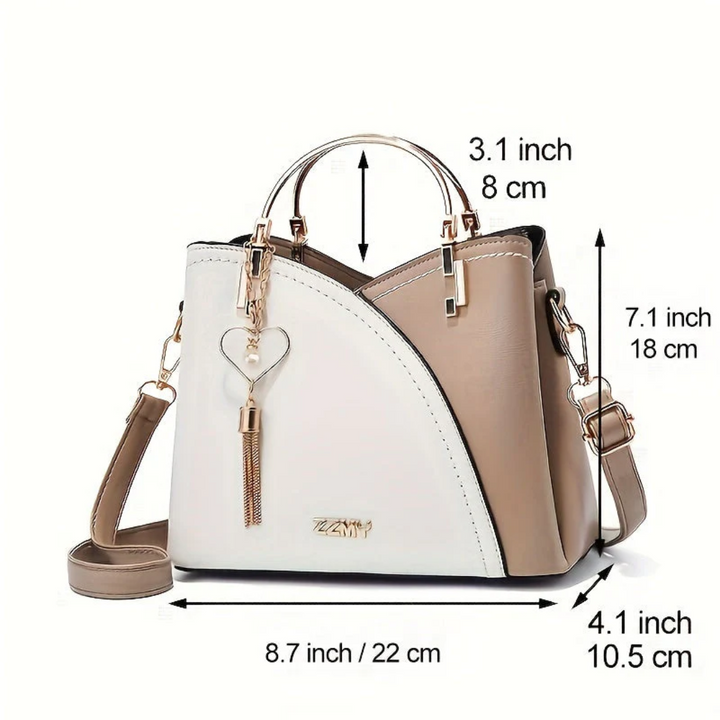 Chic ladies' faux leather handbag. A versatile everyday carry purse for fashion-forward women.