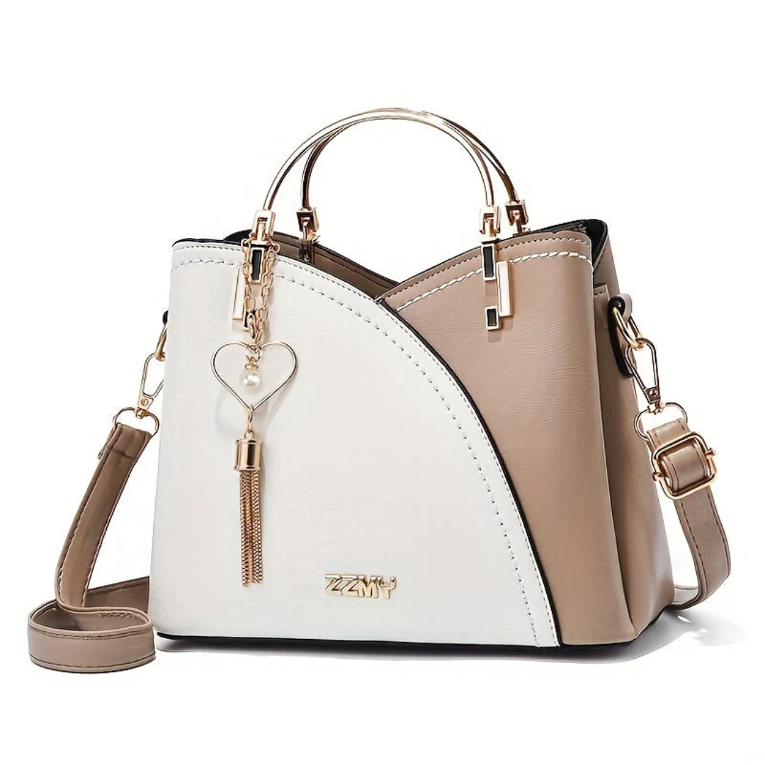 Elegant women's handbag in faux leather. A versatile shoulder bag for daily use and sophistication.