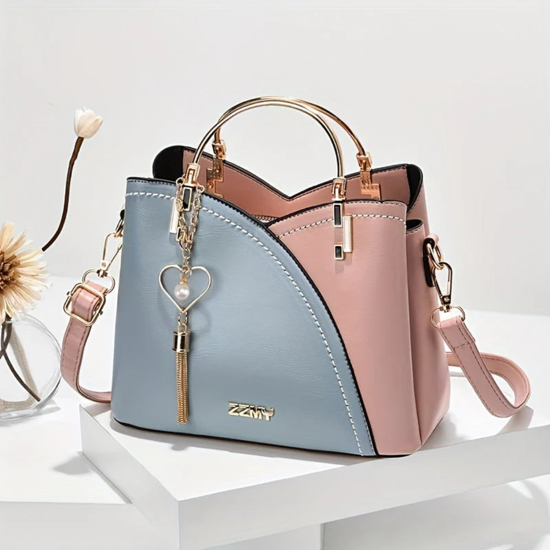 Modern elegant faux leather women's shoulder bag, a chic and practical fashion accessory.
