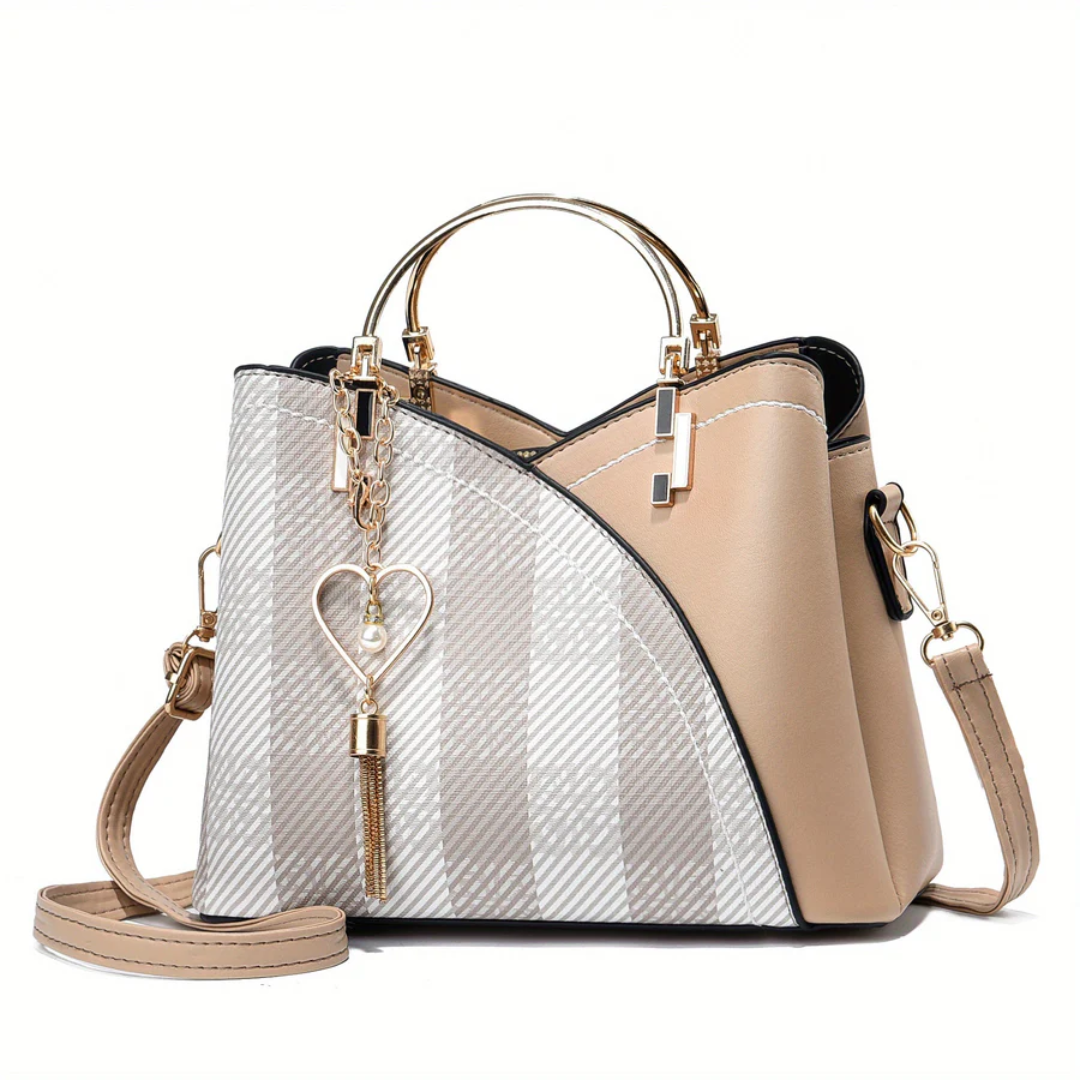 Refined faux leather ladies' handbag. An elegant and versatile shoulder bag for women.
