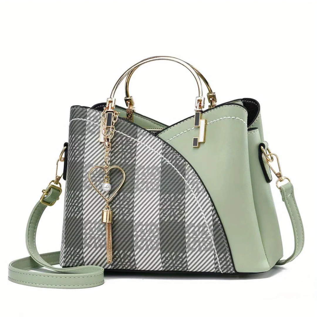 Fashionable faux leather shoulder bag for ladies. A timeless, elegant accessory for every ensemble.