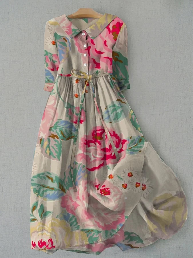 Elegant women's floral A-line midi dress, perfect for summer. Features short sleeves & flowy fabric for casual everyday fashion.