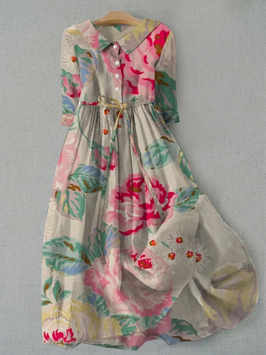 Elegant women's floral A-line midi dress, perfect for summer. Features short sleeves & flowy fabric for casual everyday fashion.