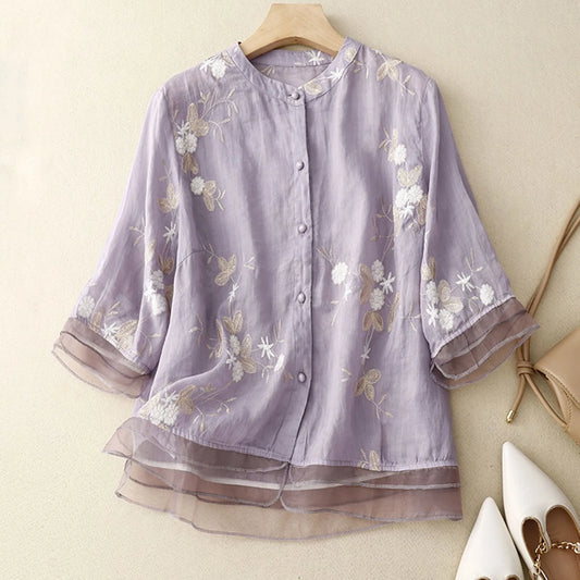 Elegant women's floral bloom blouse, perfect for spring fashion. Chic & stylish daytime wear.