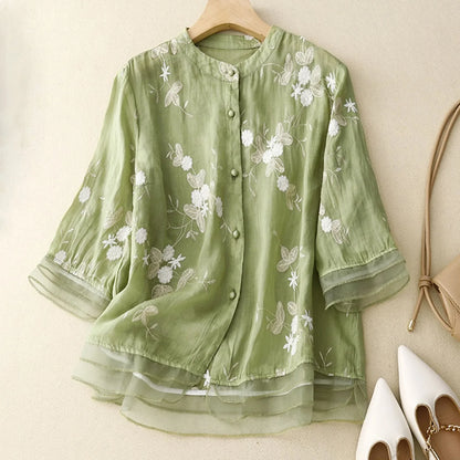 Sheer embroidered floral blouse for women. Romantic summer style, elegant and chic apparel.