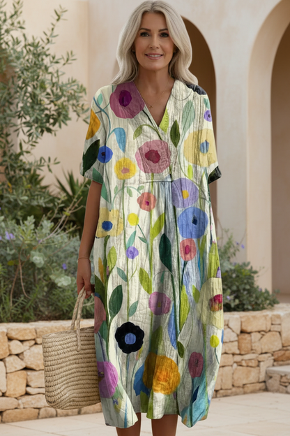 Close-up of vibrant floral print on elegant V-neck maxi summer dress fabric, showcasing comfort and style.