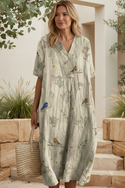 Detailed view of the elegant V-neckline on a Women's Floral Bloom Maxi Summer Dress, highlighting its chic design.