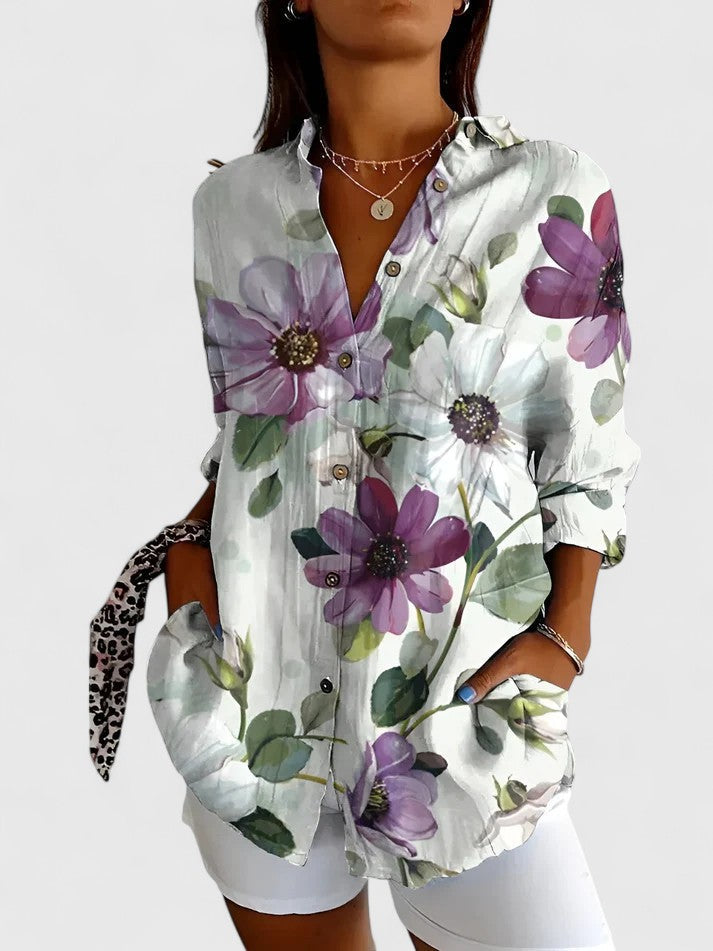 Feminine all-season floral blouse for women, an elegant top suitable for summer or office.