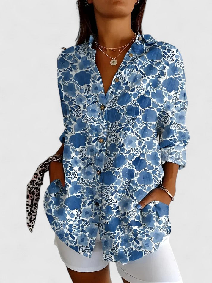 Chic women's floral print blouse, a versatile and elegant shirt for everyday or office fashion.