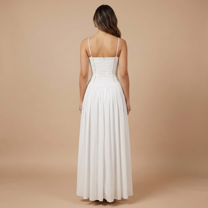 Women's elegant floral midi dress with a corset silhouette. Suitable for wedding guest & garden party.