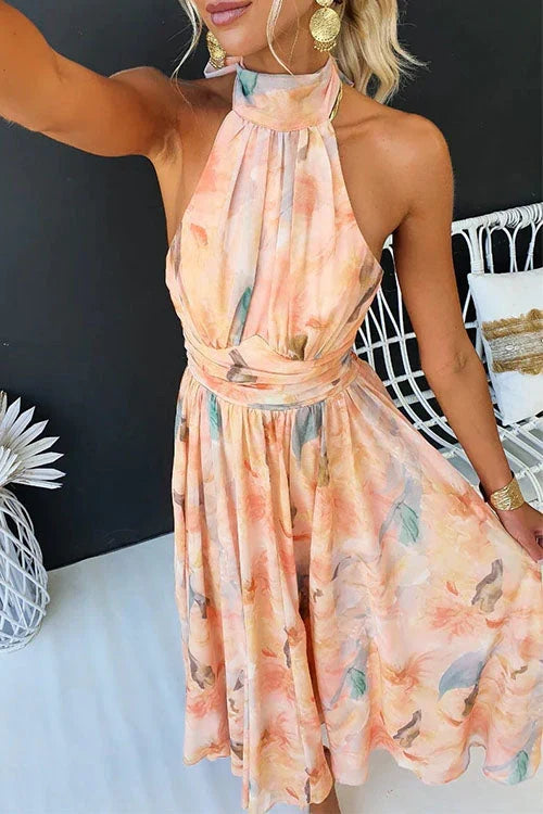 Flowy women's elegant floral halter maxi dress in vibrant multicolor. Perfect formal long party or summer occasion wear.
