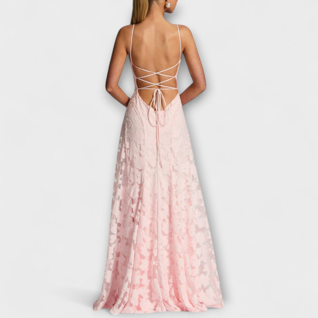 Feminine floral lace spaghetti strap maxi dress. Ideal for elegant parties, galas, and romantic evenings.
