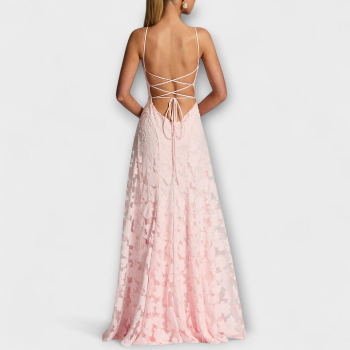 Feminine floral lace spaghetti strap maxi dress. Ideal for elegant parties, galas, and romantic evenings.